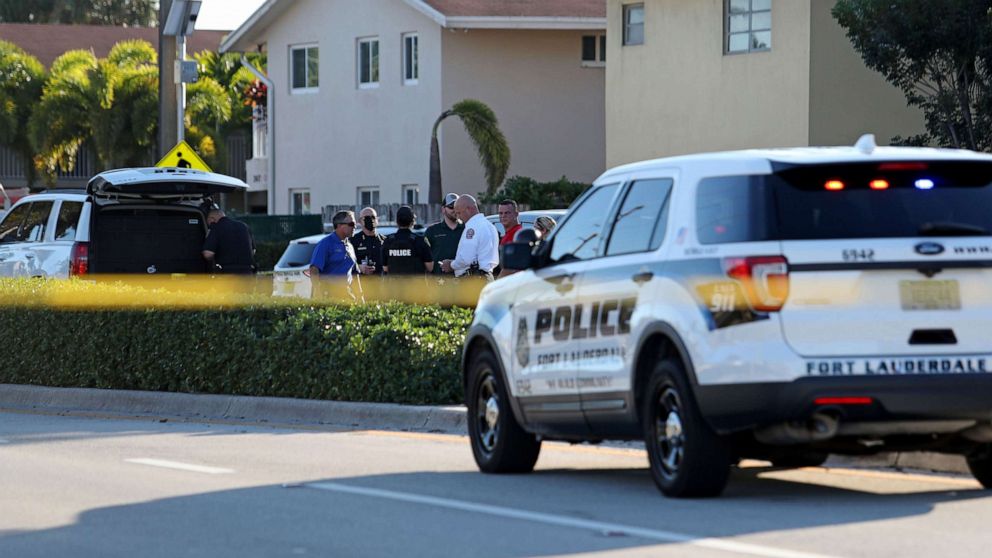 PHOTO: Law enforcement officials are seen after reports of two children being killed and three others hospitalized after a car crash in Wilton Manors, Florida, Dec. 27, 2021.