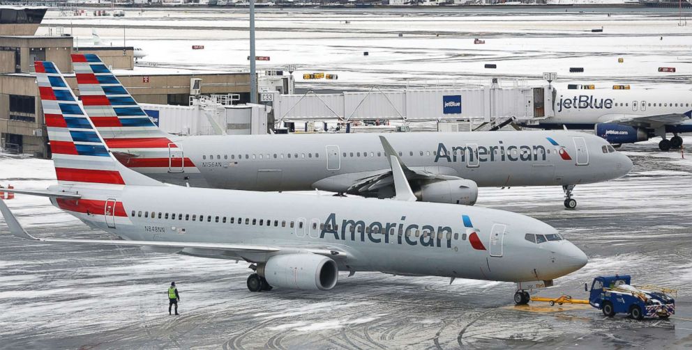 PHOTO: American Airlines passenger planes prepare for takeoff at Boston Logan International Airport in Boston, Mass., on Jan 30, 2018.