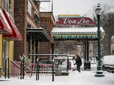 Major winter storm covers 13 states, breaking snowfall records as it moves east