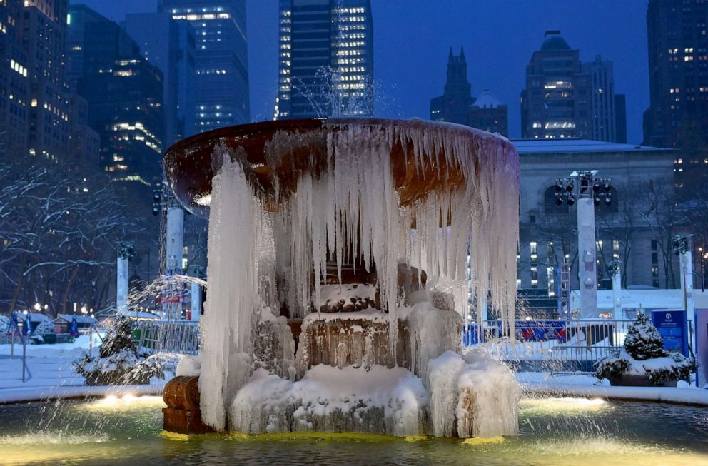 PHOTO: The Josephine Shaw Lowell Memorial Fountain is seen covered in ice during a winter storm, Feb. 1, 2021, in New York City.