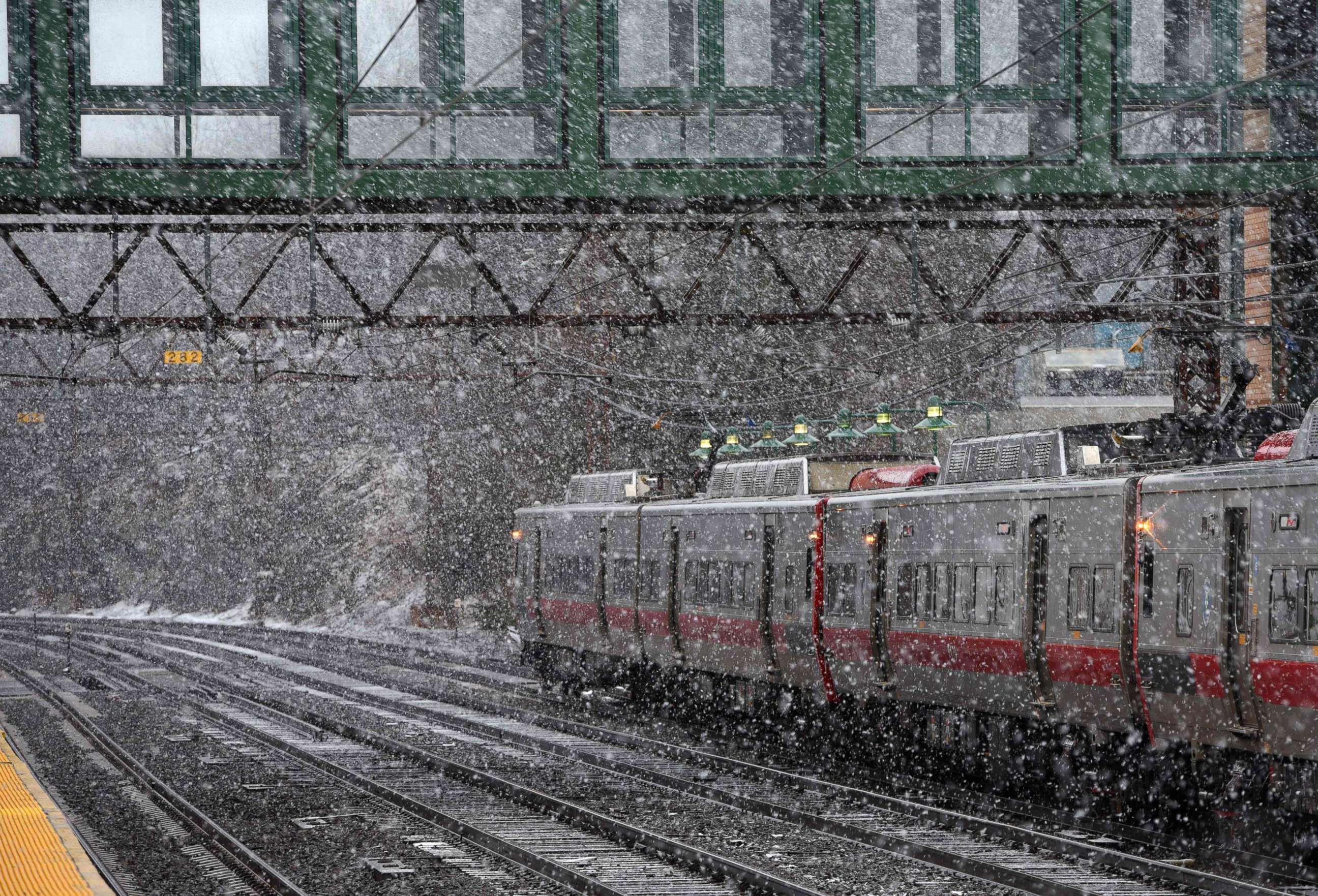 PHOTO: A New Haven Line Metro North train makes its way around a turn at the Metro North Station in Greenwich, Conn., March 13, 2018, as New England's third nor'easter in less than two weeks hits the area with the heaviest snow in the Boston area.