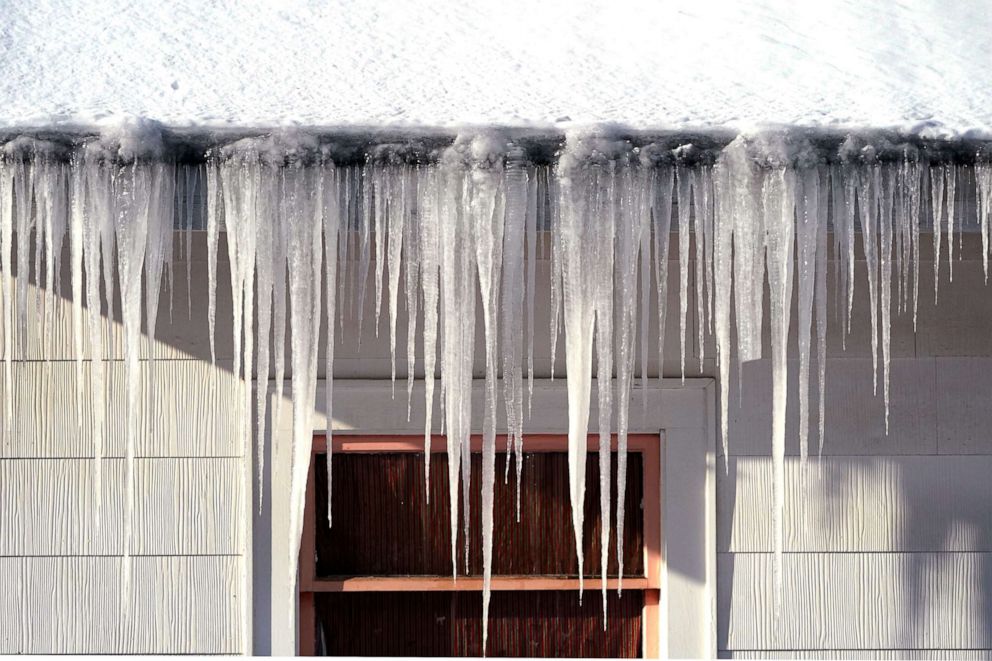 PHOTO: Long icicles hang from a house where nearly a foot of snow fell over the weekend, Dec. 27, 2021, in Bellingham, Wash.