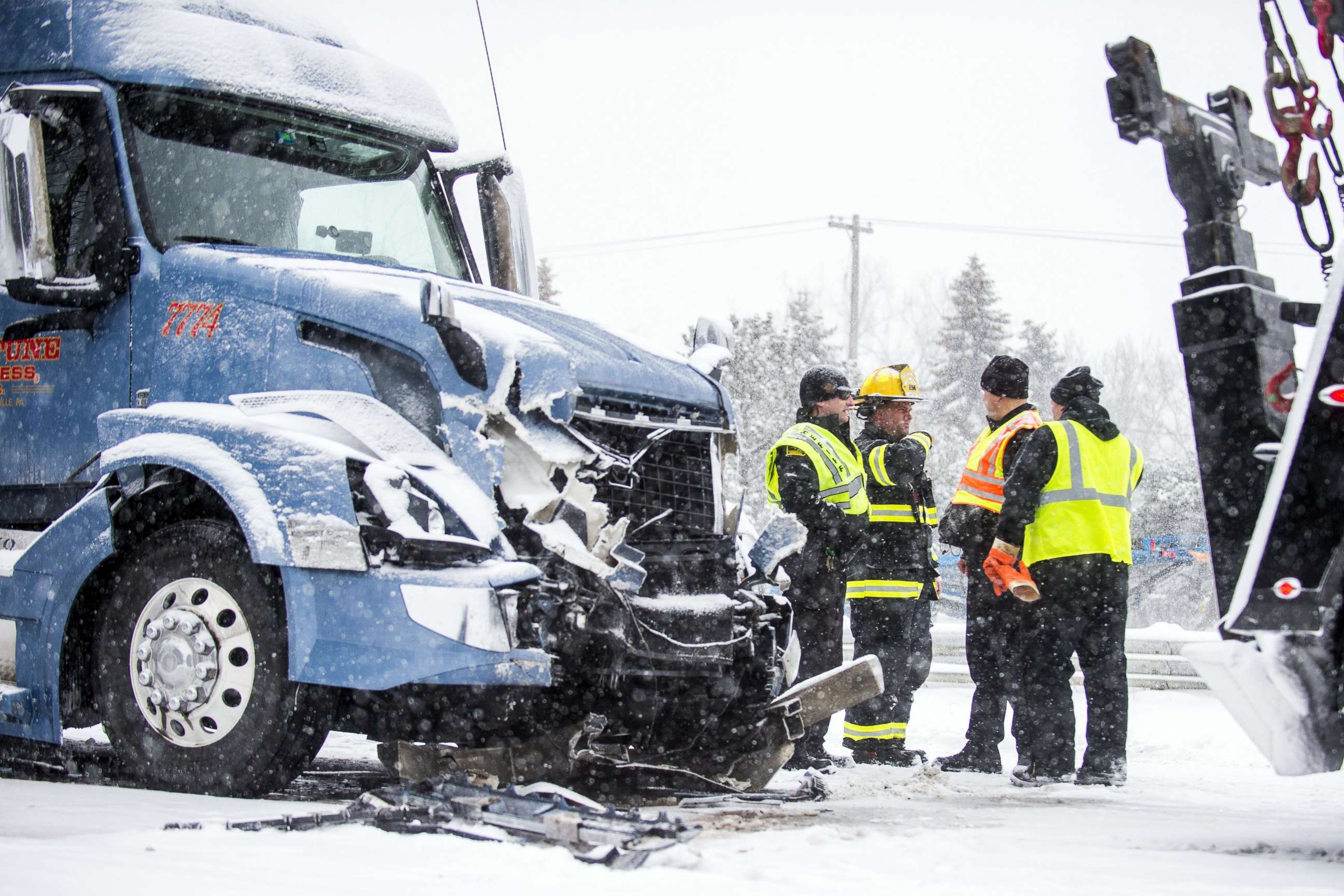 PHOTO: Emergency personnel work at the scene of a multiple vehicle crash along U.S. route 23 northbound, Feb. 9, 2018, in Fenton, Mich. 