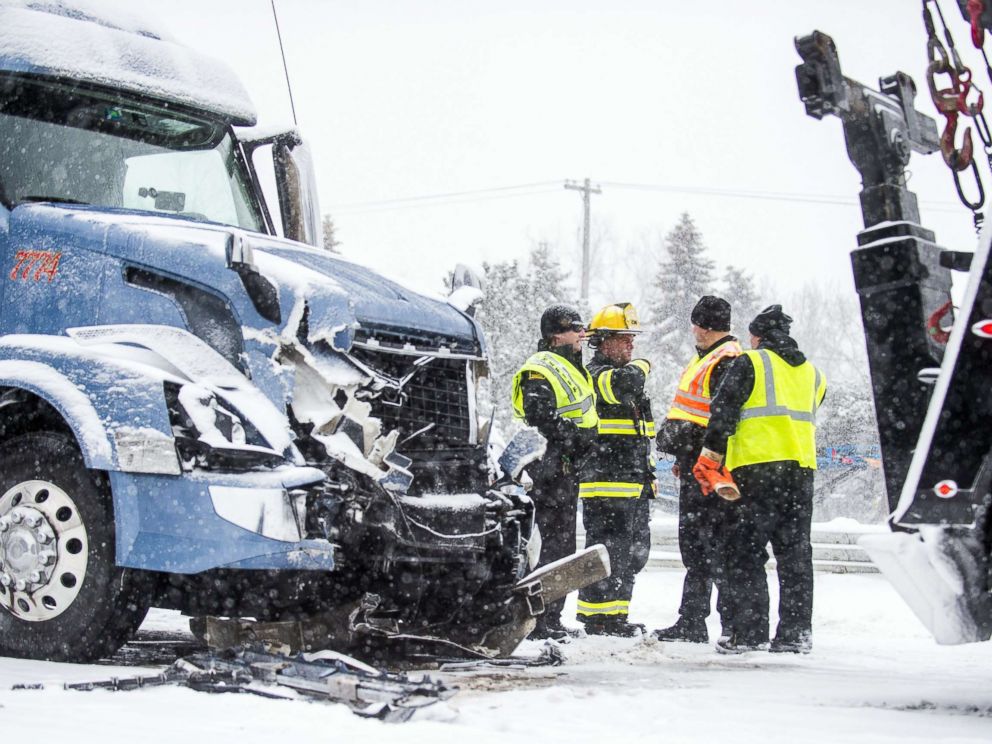 PHOTO: Emergency personnel work at the scene of a multiple vehicle crash along U.S. route 23 northbound, Feb. 9, 2018, in Fenton, Mich.