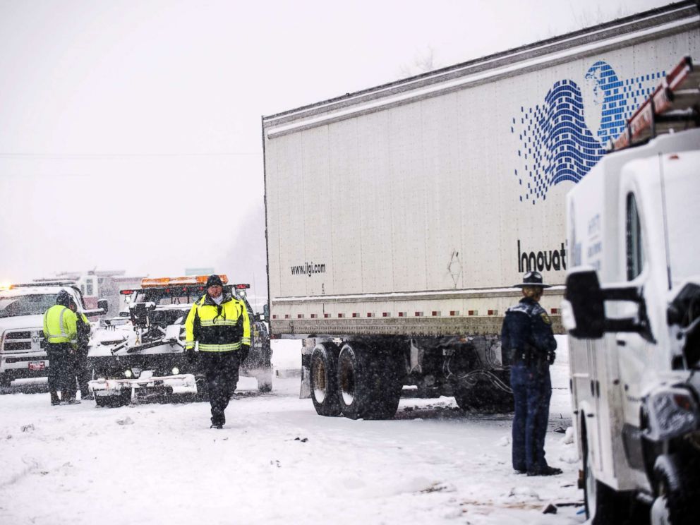 PHOTO: Emergency personnel work at the scene of a multiple vehicle crash along U.S. route 23 northbound, Feb. 9, 2018, in Fenton, Mich.