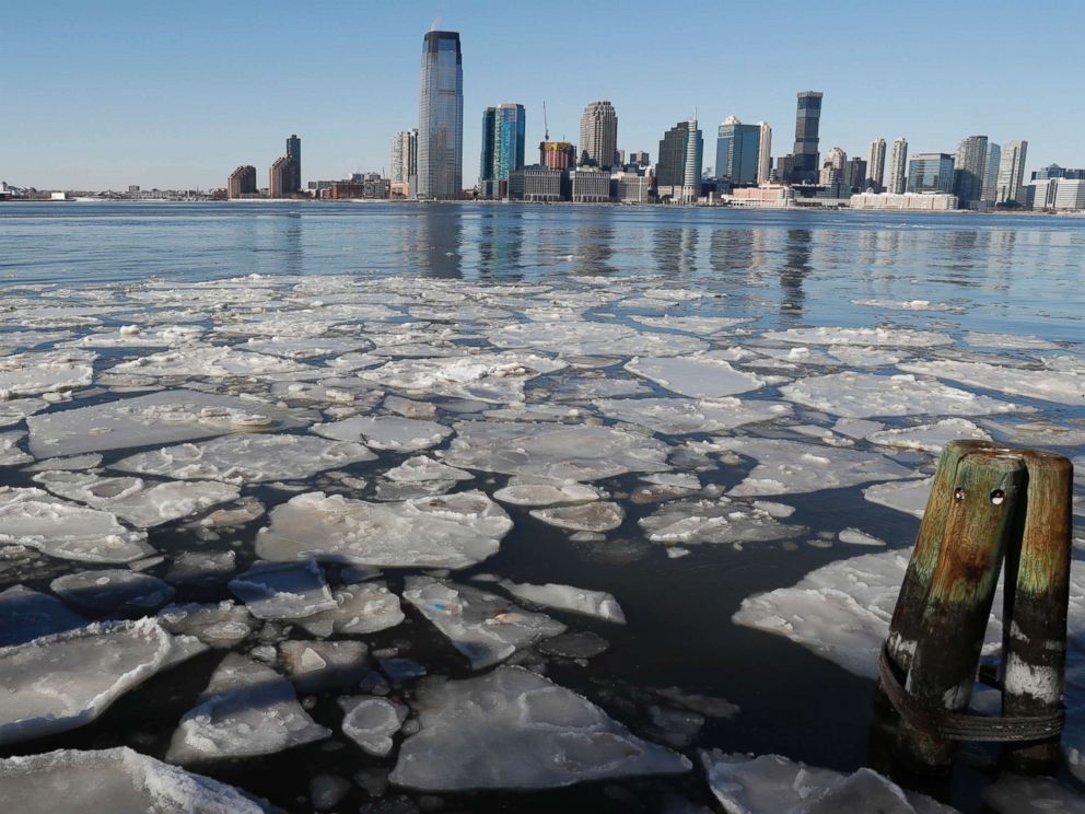 PHOTO: Ice floats in the Hudson River in Lower Manhattan with Jersery City, N.J., visible across the river, Jan. 7, 2018, as bitterly cold temperatures continued through the weekend in New York. 