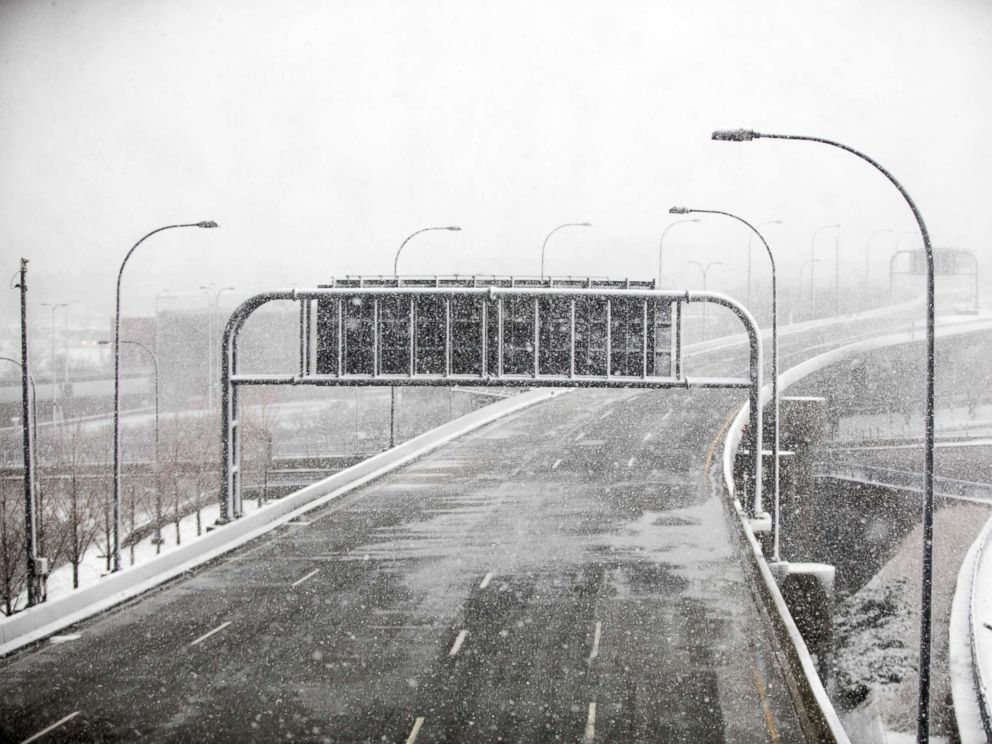PHOTO: The road into Logan International Airport is empty as a winter storm bears down, March 13, 2018, in Boston.