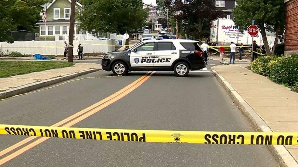 PHOTO: Scene where a retired state trooper and a woman were killed in Winthrop, Massachusetts on June 26, 2021, after a suspect rammed a stolen truck into a house, police said.