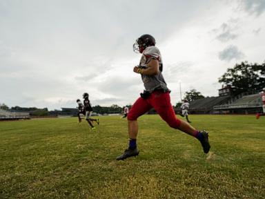 Takeaways from AP report on risks of rising heat for high school football players