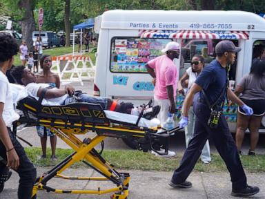Police arrest a suspect in a shooting at an Ohio festival that wounded 12