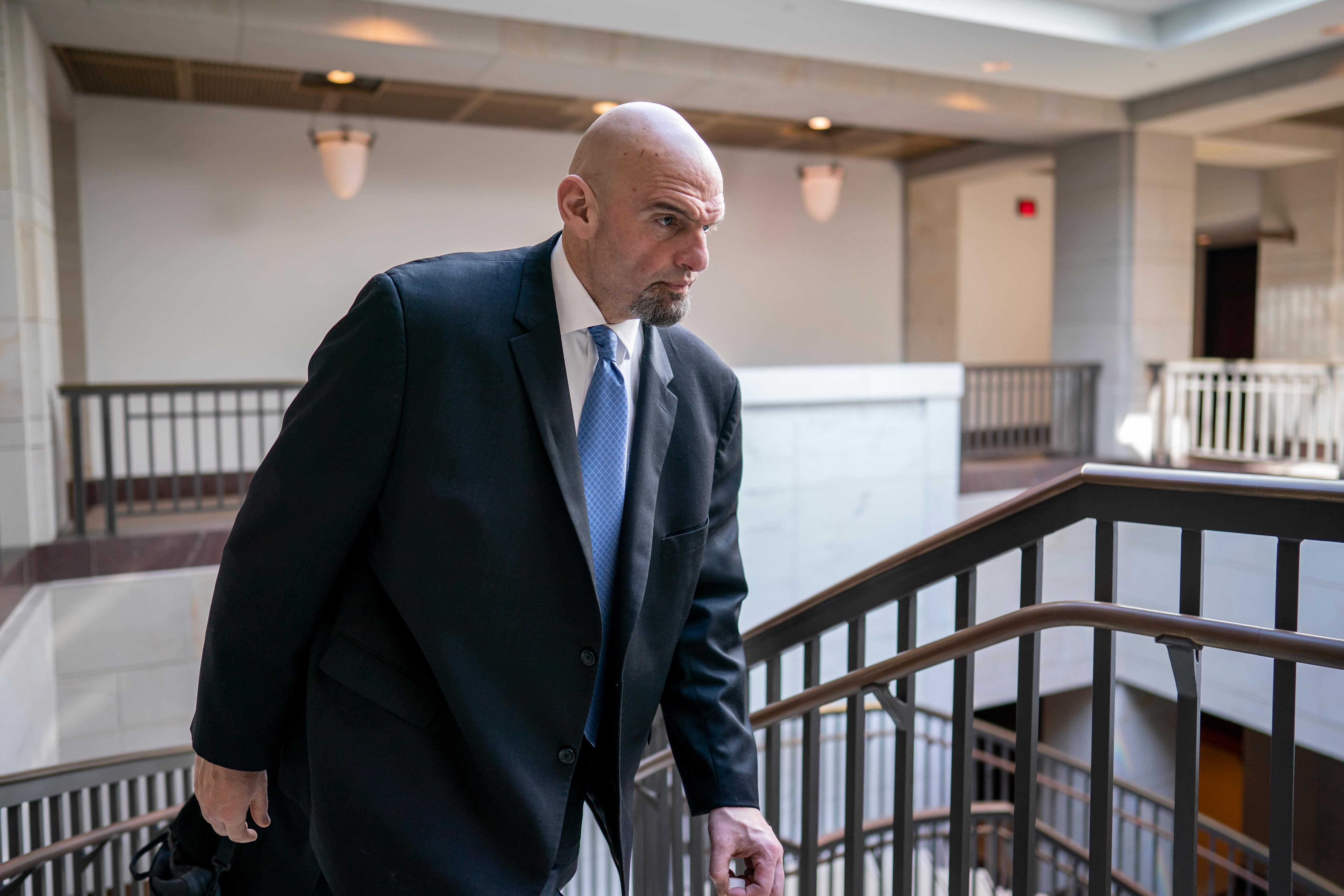 PHOTO: Pennsylvania's Lieutenant Governor John Fetterman speaks to supporters gathered in Dickinson Square Park in Philadelphia as he campaigns for the US Senate, Oct. 23, 2022.