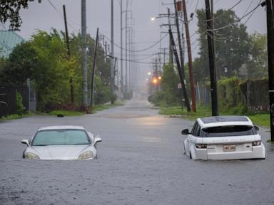 An ER nurse says it was 'second nature' to rescue a man trapped in hurricane floodwaters