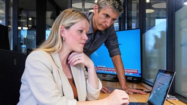 Jane Ferguson, founder of Noosphere, and Sebastian Walker, head of content, are photographed in the site's office, in New York, Wednesday, June 25, 2025. (AP Photo/Richard Drew)