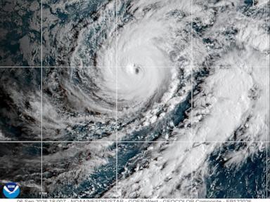 Hawaii residents told to expect tropical storm conditions as Hurricane Lowell passes to the west