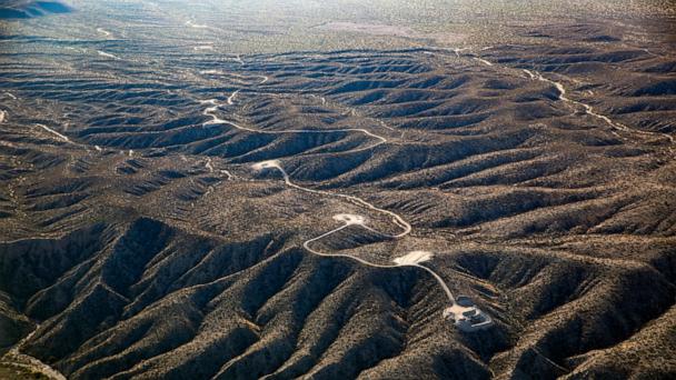 This aerial photo taken on Nov. 13, 2023, by Archaeology Southwest with a volunteer pilot and Lighthawk, a nonprofit organization, shows access roads and tower pad sites west of the San Pedro River, near Redrock Canyon, in Arizona. (Archaeology Southwest via AP)