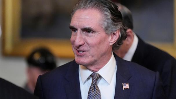 FILE - Interior Secretary Doug Burgum arrives before President Donald Trump speaks during an executive order signing event in the East Room of the White House, Tuesday, April 8, 2025, in Washington. (AP Photo/Alex Brandon,File)