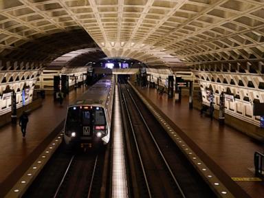 A work vehicle hits a stopped Washington Metro train, injuring 11