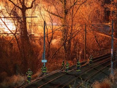 Brushfire at Baltimore wood recycling yard closes expressway, light rail, schools