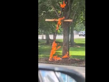 A person is in custody in a Chicago cross burning investigation, police say
