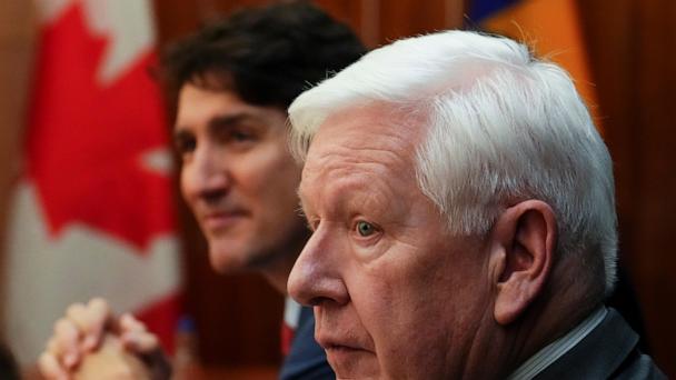 FILE - Canada's Prime Minister Justin Trudeau and Canadian Ambassador to the United Nations Bob Rae, right, take part in a bilateral with Prime Minister of Barbados Mia Mottley (not shown) during the Conference of Heads of Government of the Caribbean Community (CARICOM) in Nassau, Bahamas, Thursday, Feb. 16, 2023. (Sean Kilpatrick /The Canadian Press via AP, File)