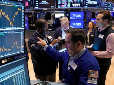 Wall Street soars to records as Dow leaps 500 in rate-cut rally that swept the world