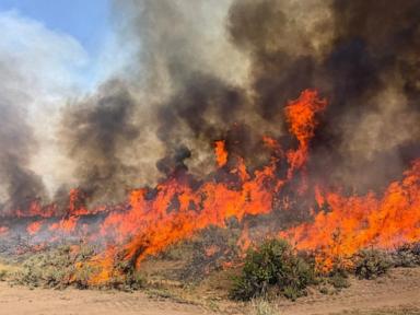 Dangerous wildfire keeps crews from reaching helicopter crash in Utah