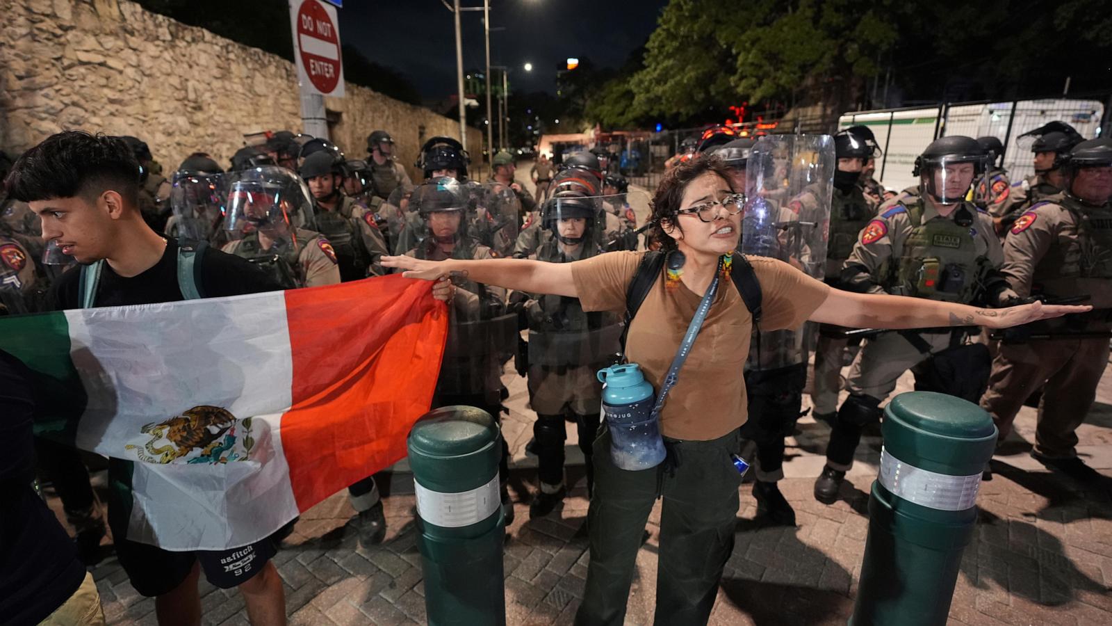 Protests over immigration raids pop up across the US with more planned