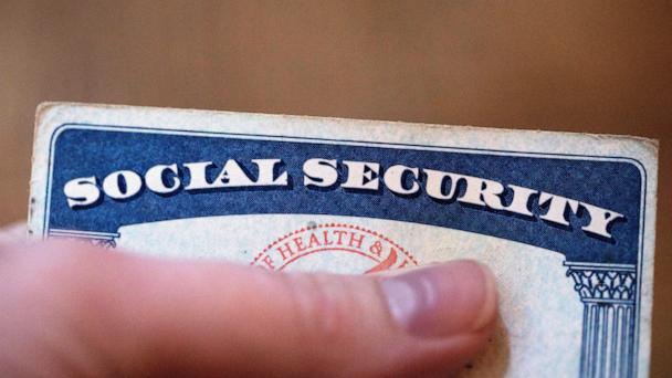 FILE - A Social Security card is displayed on Oct. 12, 2021, in Tigard, Ore. The go-broke dates for Medicare and Social Security’s trust funds have moved up as rising health care costs and new legislation affecting Social Security benefits have contributed to closer projected depletion dates. That's according to an annual report released Wednesday. (AP Photo/Jenny Kane, File)