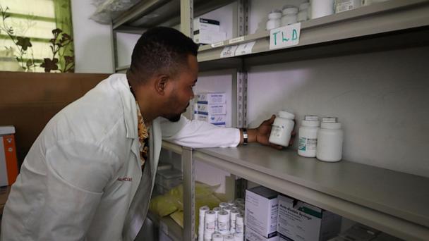 Dr. Execuel Laguerre checks inventory in the room where medications are stored at the New Hope Hospital, in Plaine-du-Nord, Haiti, Wednesday, May 21, 2025. (AP Photo/Patrice Noel)