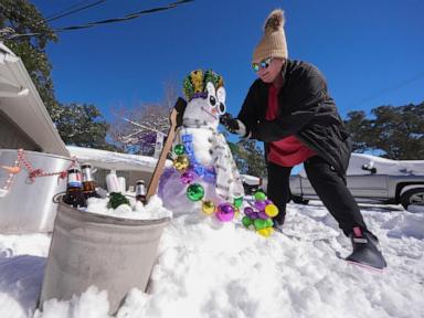 Sledding on boogie boards, ice hockey on Canal Street: The Gulf Coast embraces a rare snow day