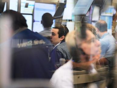 Global shares are trading mixed as market optimism about AI gets tempered by Iran worries