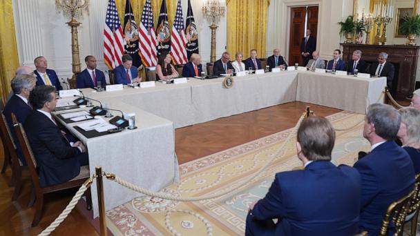 President Donald Trump, seated and center, listens during a Make America Healthy Again (MAHA) Commission Event in the East Room of the White House, Thursday, May 22, 2025, in Washington. (AP Photo/Jacquelyn Martin)