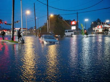Tropical storm remnants pound Gulf states with heavy rain after tornadoes hit the Midwest