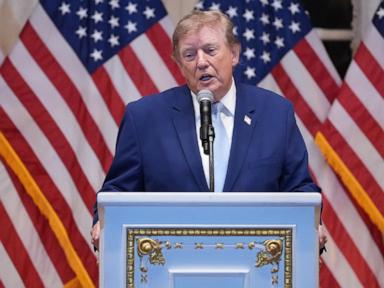 Trump puts new Russia sanctions passed by Congress on hold, saying waiver is in US national interest
