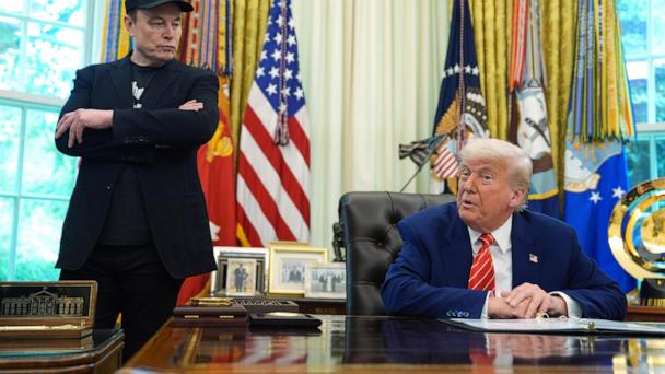 FILE - President Donald Trump, right, speaks during a news conference with Elon Musk in the Oval Office of the White House, Friday, May 30, 2025, in Washington. (AP Photo/Evan Vucci, File)