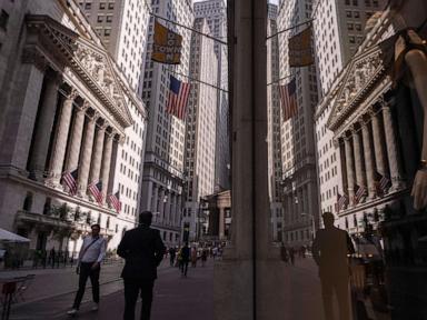  Asian shares are mixed after Wall Street closes higher and edges to more records