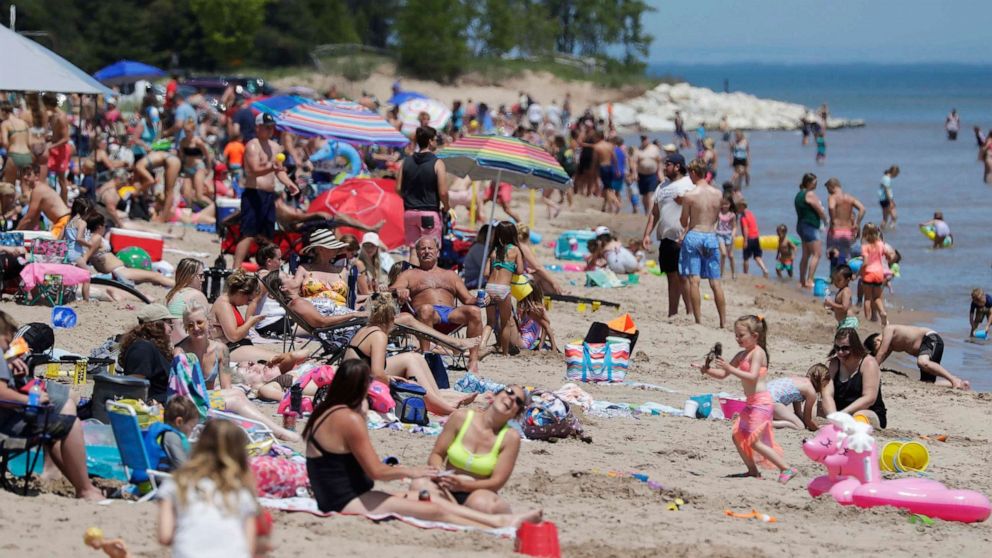 PHOTO: Crowds are seen at Neshotah Beach, June 25, 2020, in Two Rivers, Wis.