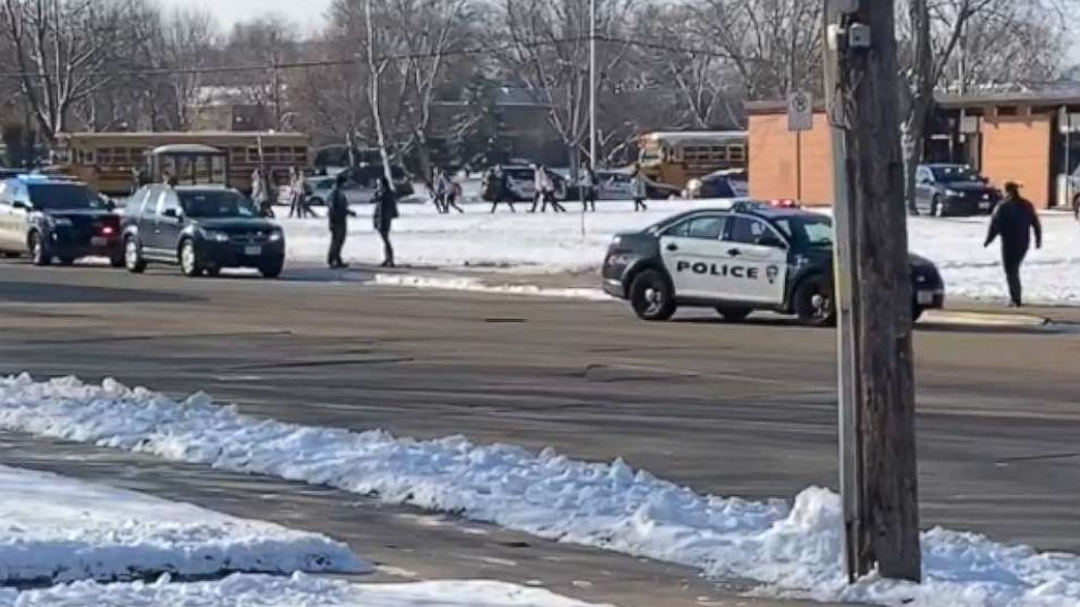 PHOTO: Students exit Oshkosh West High School in Wisconsin after an officer-involved shooting, Dec. 3, 2019.