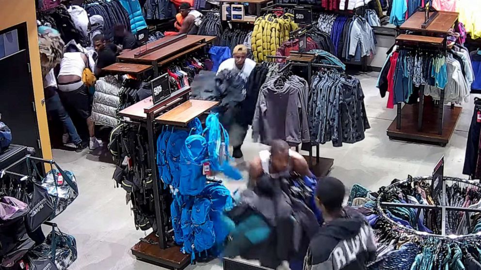 PHOTO: This image made from video shows a flash mob grabbing merchandise from a North Face store in Wisconsin this week.