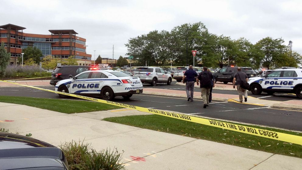 PHOTO: Emergency personnel arrive at the scene where a shooting was reported at a software company in Middleton, Wis., a suburb of Madison, Sept. 19, 2018.