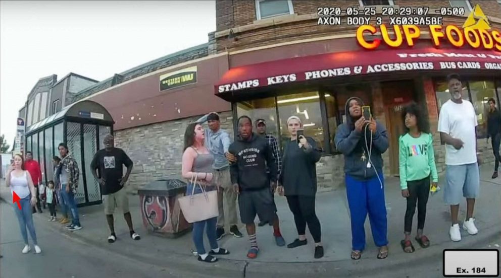 PHOTO: An image of witnesses at the scene from Officer Thao’s body camera, during the arrest of George Floyd in Minneapolis, May 25, 2020, exhibited during the trial of former police officer Derek Chauvin.
