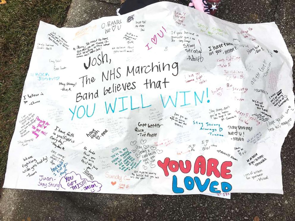 PHOTO: The Norcross High School marching band made a poster to carry as they marched to Josh Libman's house Thursday.