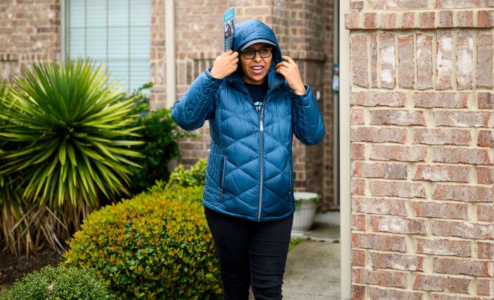 PHOTO: Candace Valenzuela, candidate in the Texas 24 Congressional District, knocks on doors in Irving, Texas, Feb. 23, 2020.