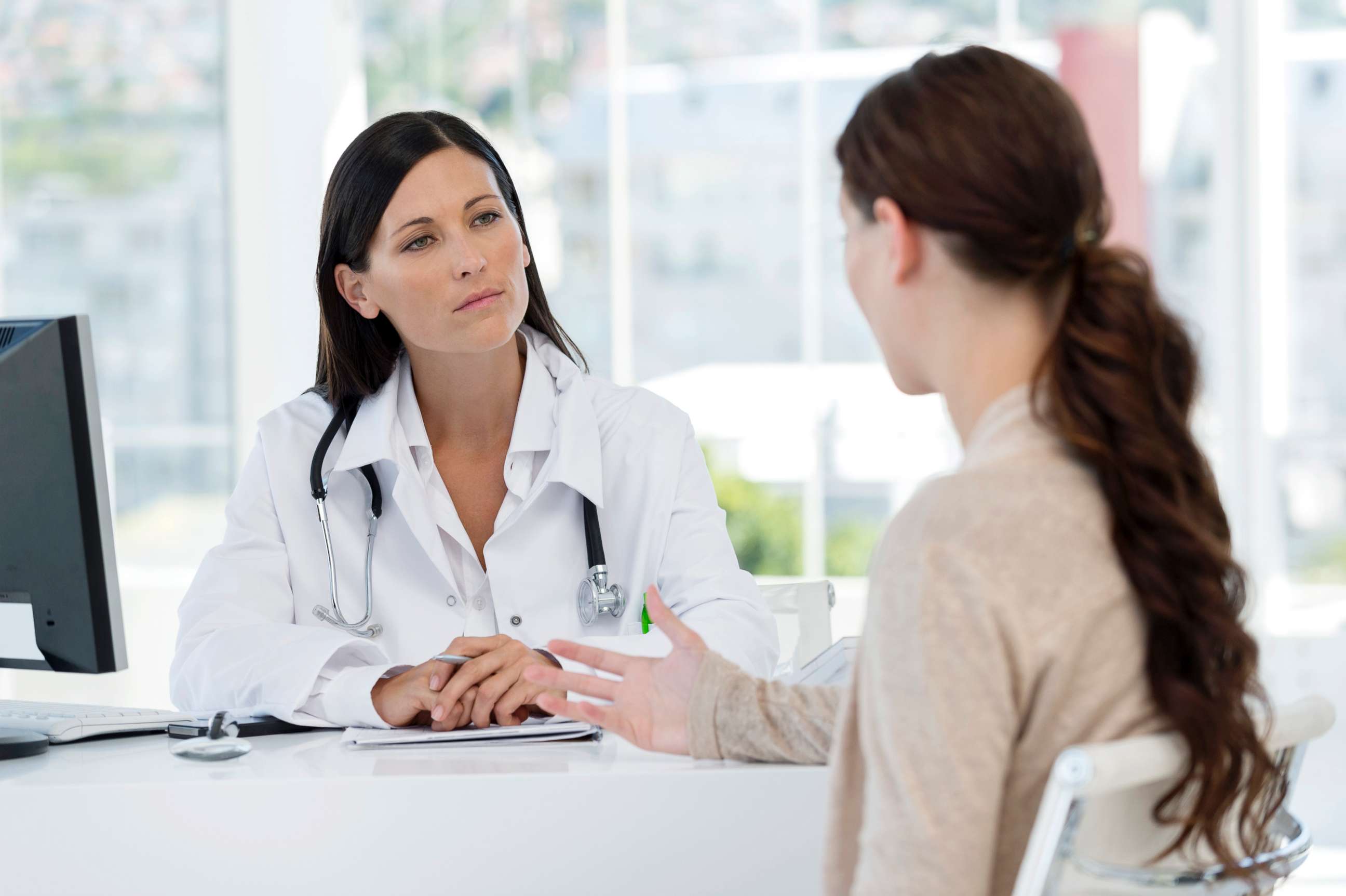 PHOTO: In this undated stock photo, a patient has a discussion with her doctor.