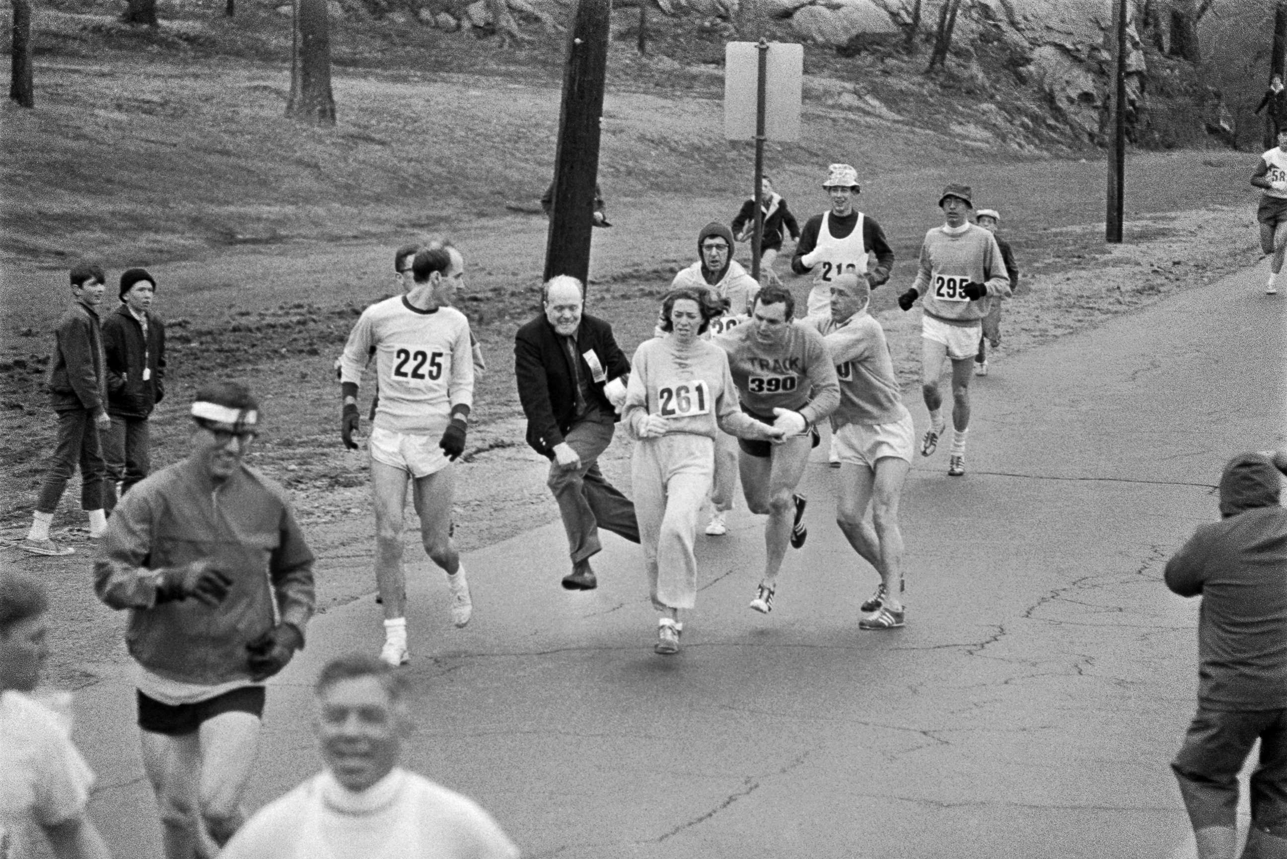 PHOTO: Kathy Switzer, of Syracuse, N.Y., is hassled by BAA Marathon Director Bill Cloney, as he attempted to stop her from competing in the Boston Marathon, a normally all-male race in Boston, April 19, 1967. 