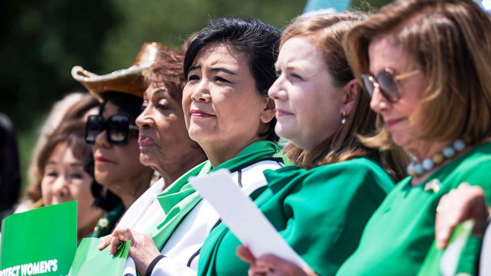 PHOTO: Rep. Judy Chu is flanked by (from right) Speaker of the House Nancy Pelosi, Reps. Lizzie Fletcher, Maxine Waters, and Frederica Wilson, as they attend a rally on the steps of the U.S. Capitol, July 15, 2022.