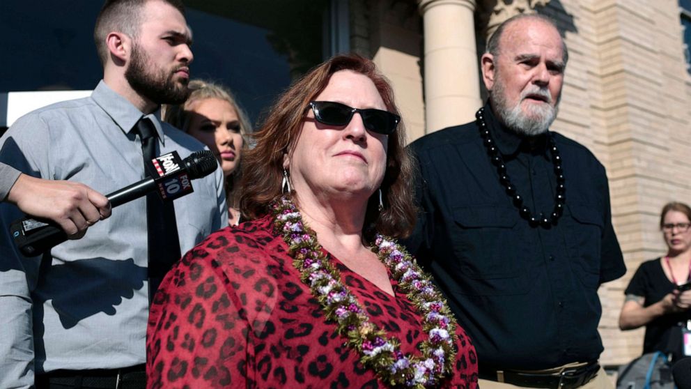 PHOTO: Kay Woodcock, center, and Larry Woodcock, right, address the media outside court at a hearing for Lori Vallow Daybell, March 6, 2020, in Rexburg, Idaho.