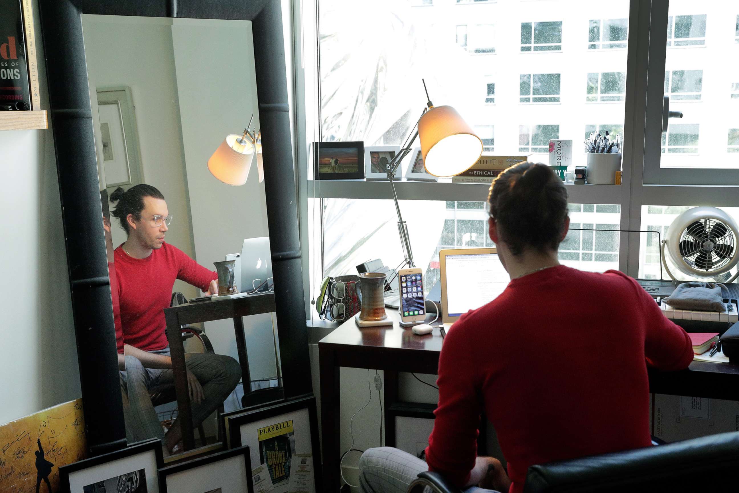 PHOTO: Cory Winter works in the bedroom of his apartment in San Francisco, Calif., April 28, 2020. 