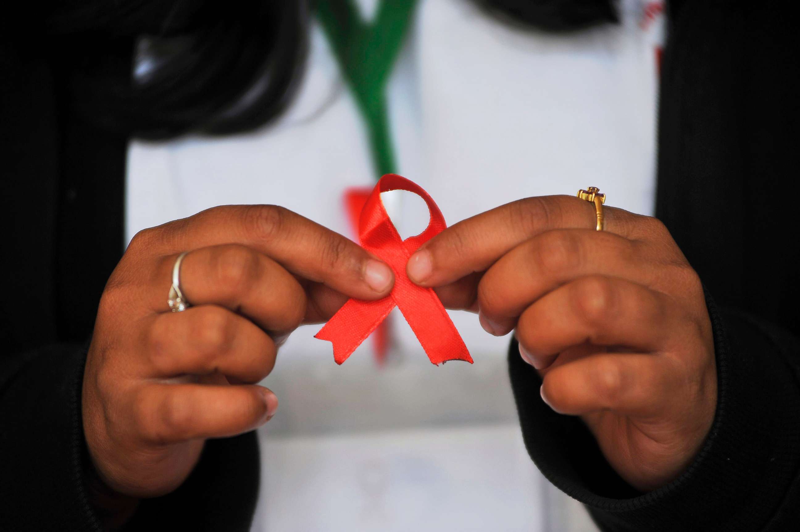 PHOTO: A Nepalese youth shows AIDS symbol Red Ribbon on celebrates of 29th World AIDS Day in Kathmandu, Nepal, Dec. 1, 2016.