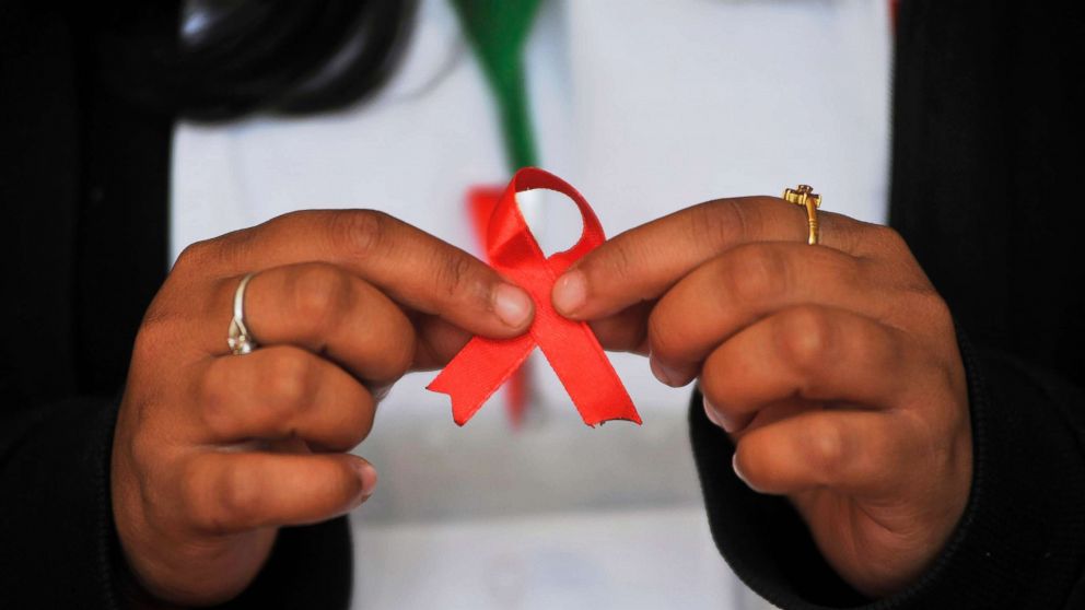 PHOTO: A Nepalese youth shows AIDS symbol Red Ribbon on celebrates of 29th World AIDS Day in Kathmandu, Nepal, Dec. 1, 2016.
